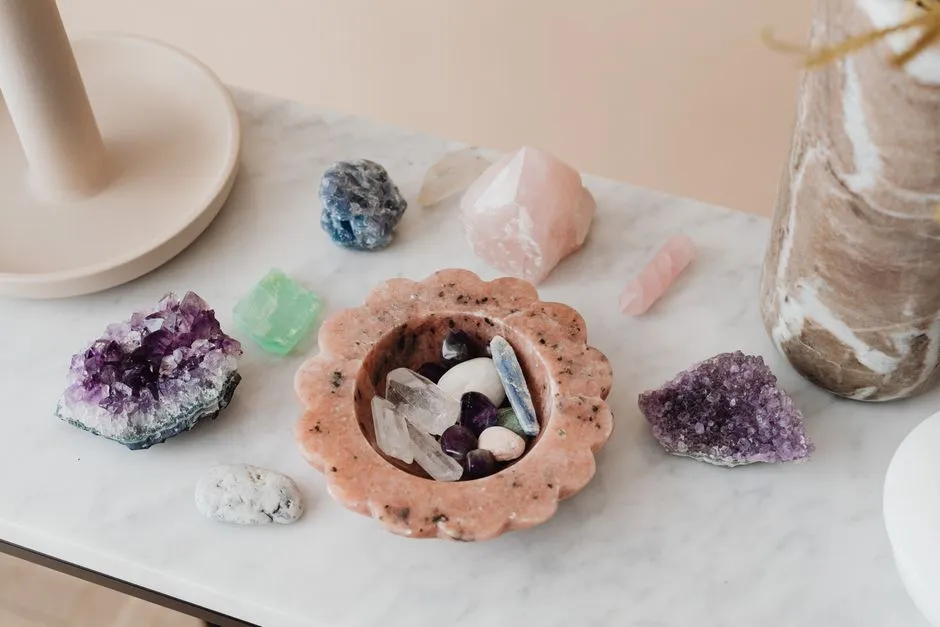Assorted crystals arranged on a marble tabletop as home decor